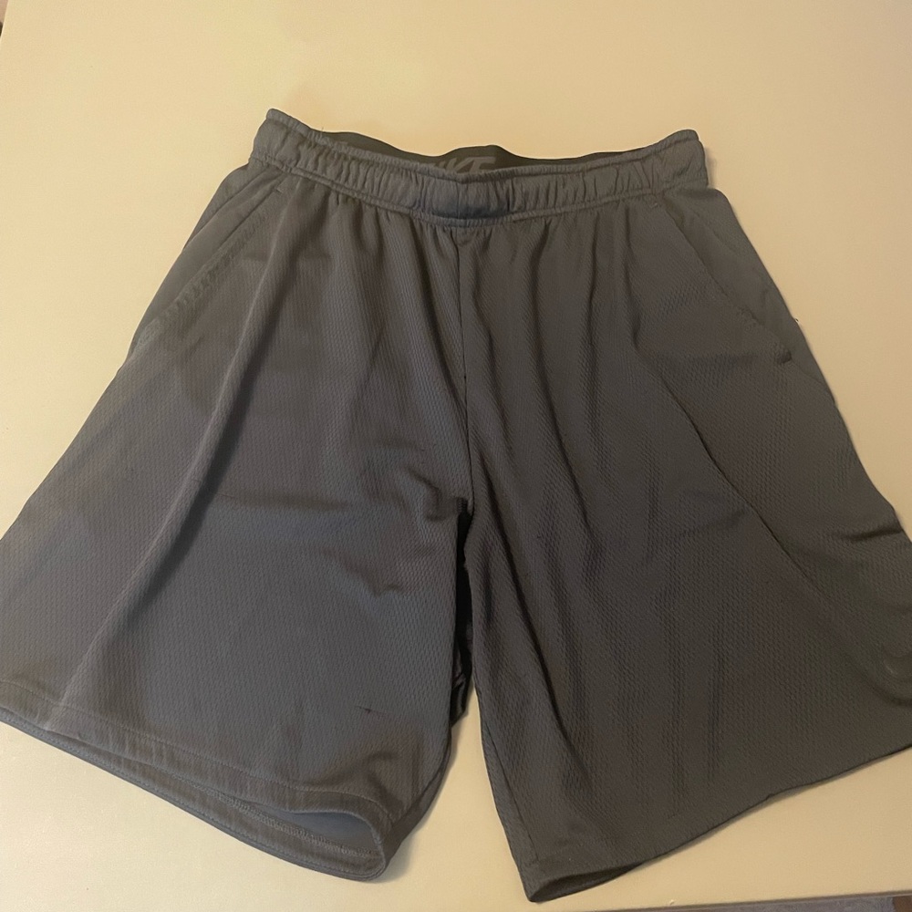 Gray Nike dri-fit shorts with drawstrings loop, but NO DRAWSTRING INSIDE